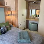 Woodpecker Lodge, Camelot Holiday Park, Ca6 5Sz