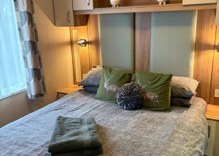 Woodpecker Lodge, Camelot Holiday Park, Ca6 5Sz